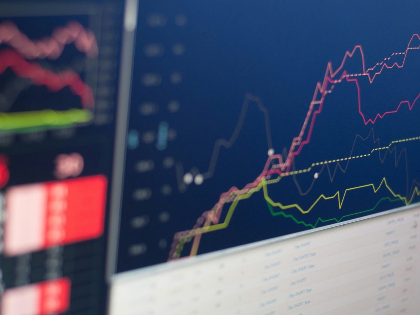 Financial analyst reviewing a valuation and financial model on screen